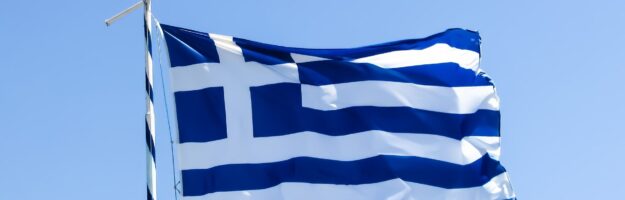 Le drapeau grec bleu et blanc qui flotte : Histoire récente de la Grèce