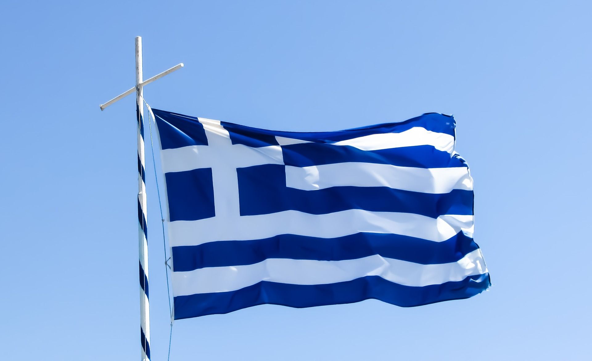 Le drapeau grec bleu et blanc qui flotte : Histoire récente de la Grèce